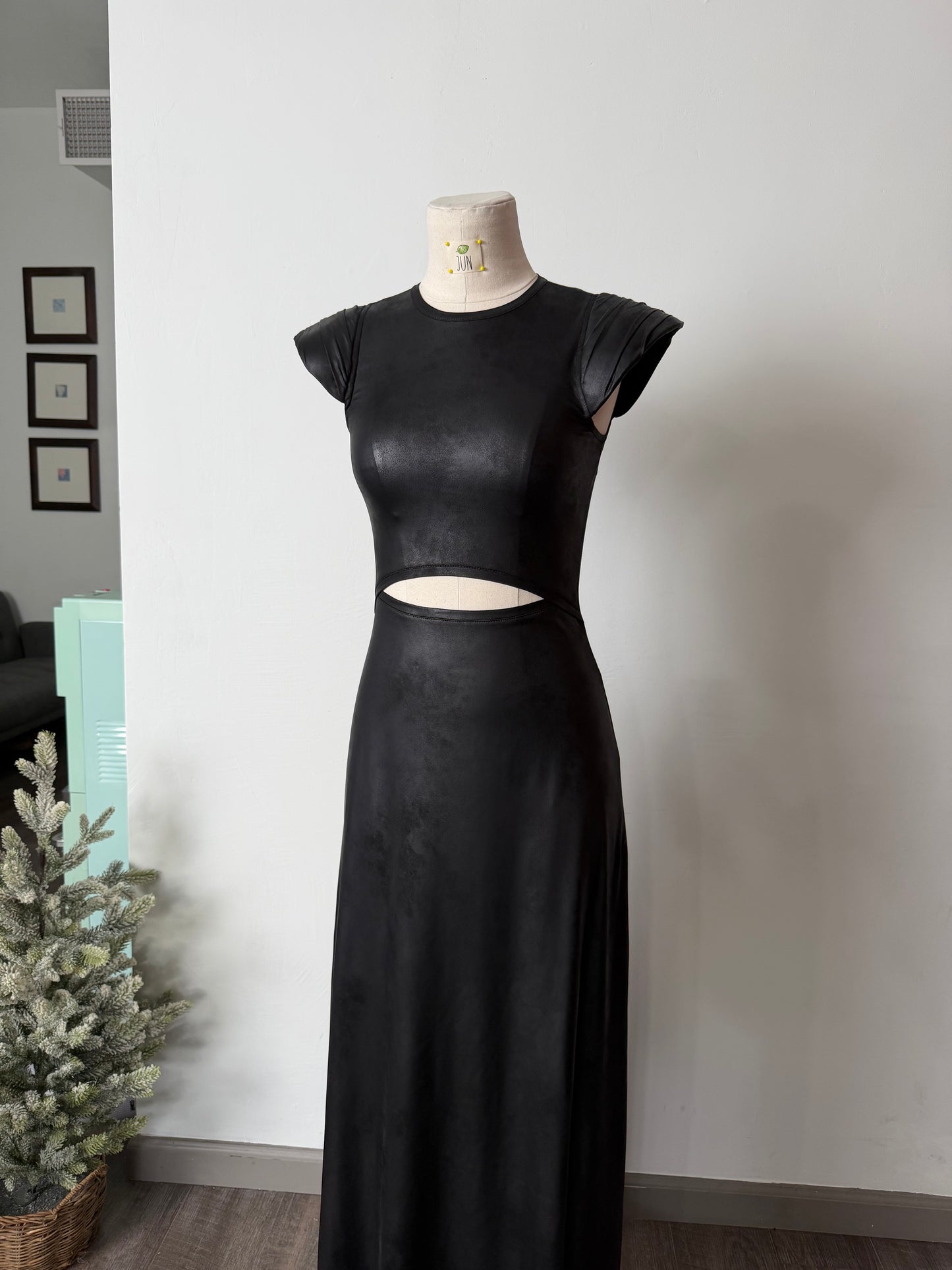 Cut-out black jersey dress with structured shoulders
