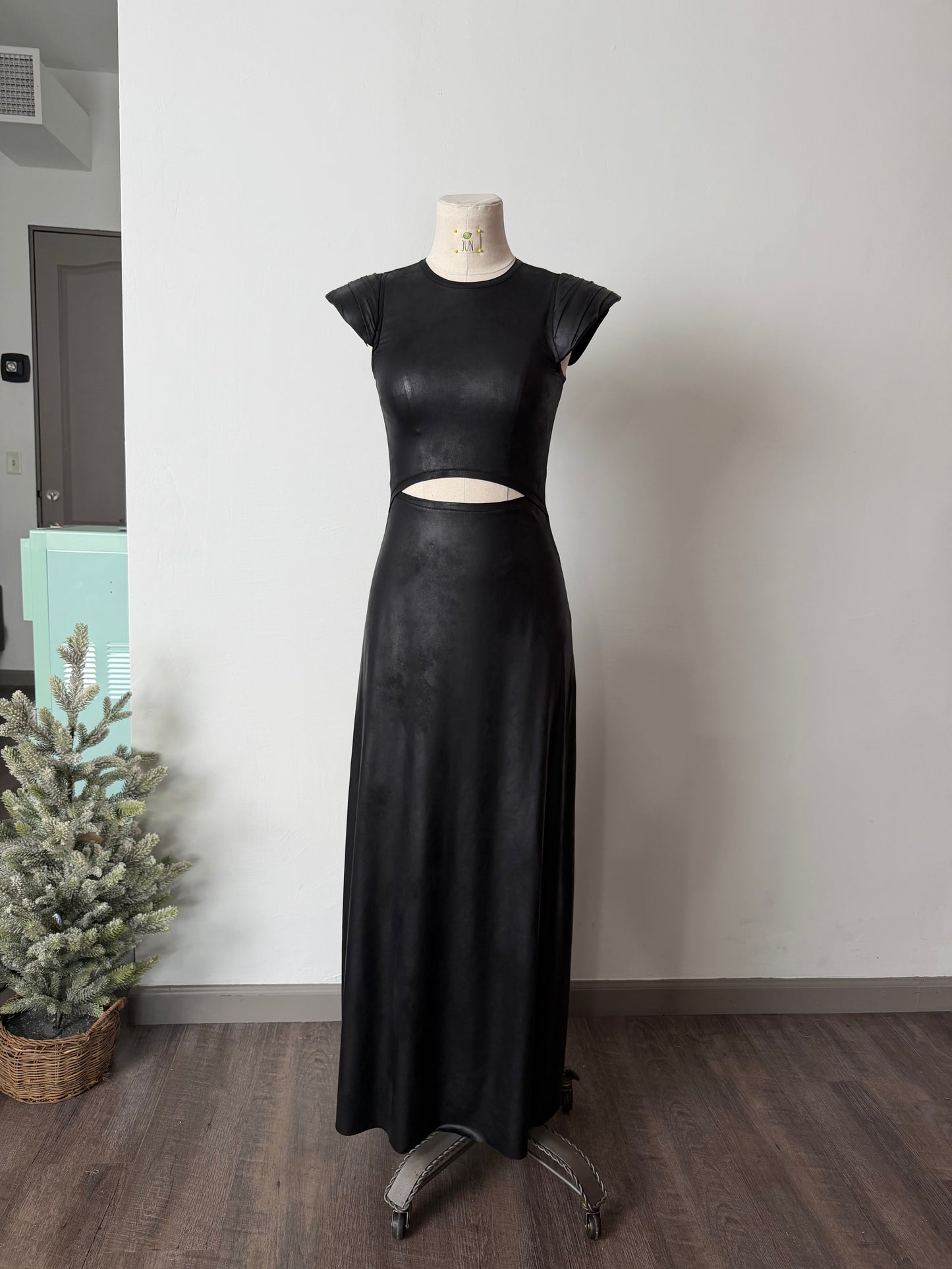 Cut-out black jersey dress with structured shoulders