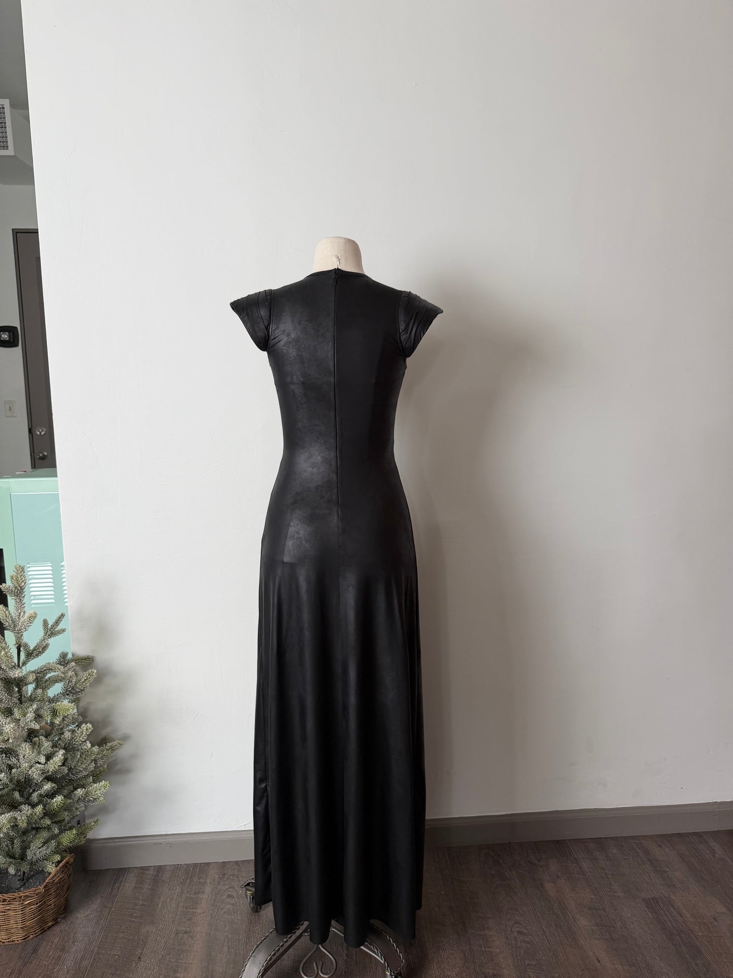 Cut-out black jersey dress with structured shoulders
