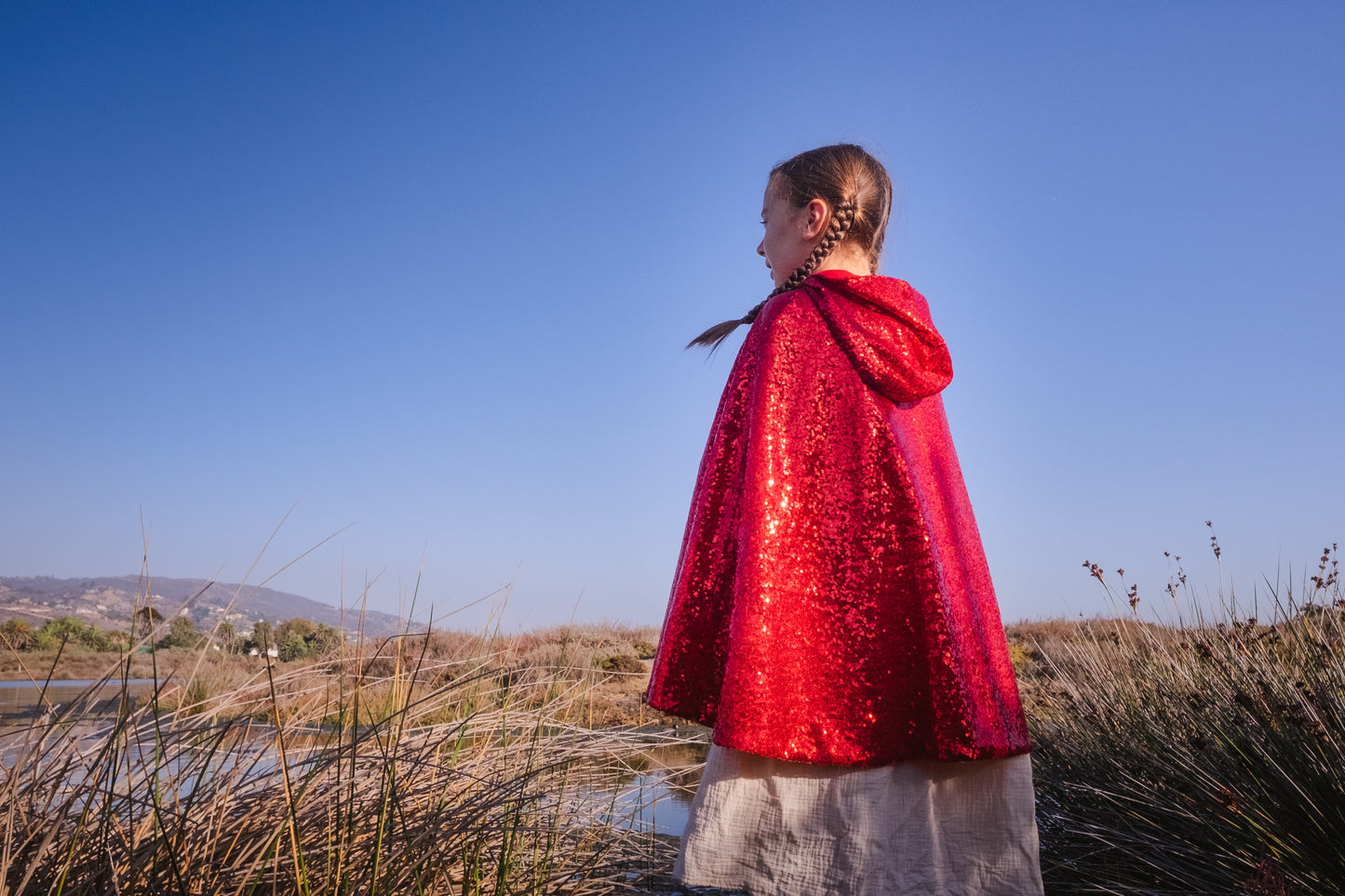Red sequin cape with a hood